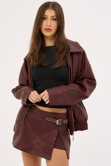 Luck + Trouble Buckle Mid Rise Faux Leather Skort Burgundy