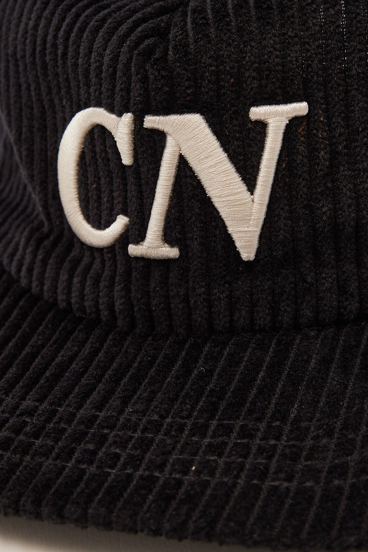 Common Need Monogram Cord Skate Cap Black