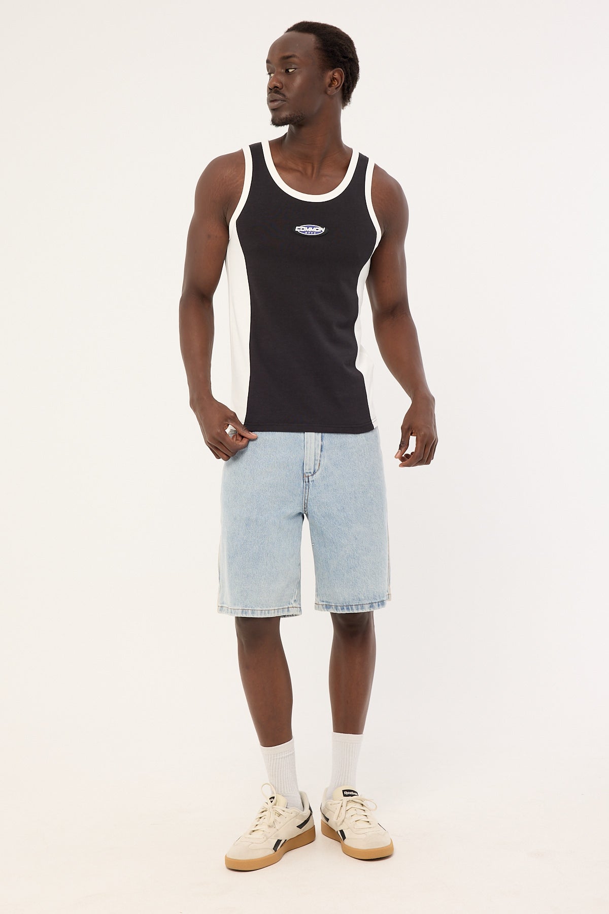 Common Need Oval Panel Singlet Washed Black